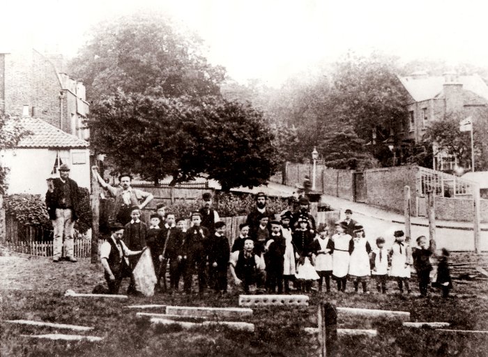 Children on West End Green, about 1882. Lawn Cottage is in the background on the right