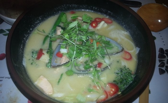 Coconut seafood broth, just before Tom (literally?) dived in