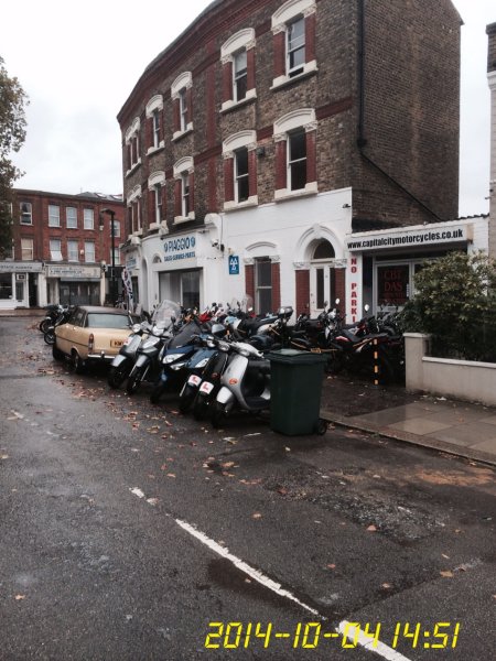 Motorcycles on the forecourt and road
