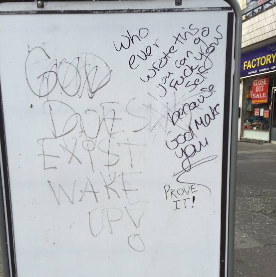 Some serious existential debate going on on the Kilburn High Road. Image via @YouMustBeAnna